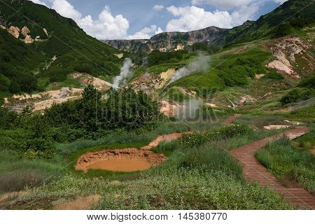 Krasnyy (Red) Mudpot in Valley of Geysers, Kamchatka, Russia