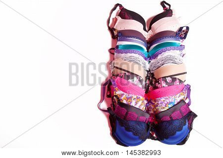 Beautiful lingerie in a row on a white background