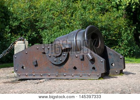 VYBORG, RUSSIA - AUGUST 08, 2016: Old two-pound mortar in Petrovsky Park of the city of Vyborg. Historical landmark of the city Vyborg