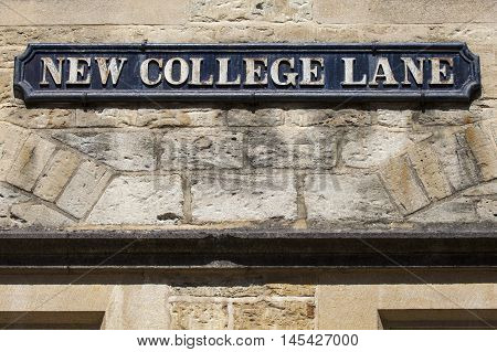 Street sign for New College Lane in the historic university city of Oxford England.