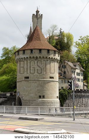 LUCERNE SWITZERLAND - MAY 04 2016: A round tower named Nolliturn is a part of Lucerne's ancient city walls.