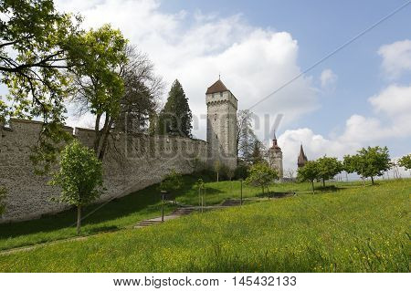 LUCERNE SWITZERLAND - MAY 04 2016: Towers of Lucerne's ancient city walls. These historic fortifications are called Musegg and are mostly very well preserved