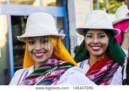 QUARTU S.E., ITALY - July 15, 2016: 30th Sciampitta - International festival of folklore - Folk Ballet de la Universidad La Paz (Bolivia) - Sardinia - portrait of beautiful smiling girls