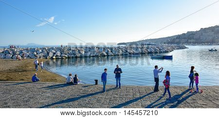 NAPLES, ITALY - OCTOBER 04: View of seafront of Naples from Via Caracciolo. Taken in October 04, 2015 in Naples, Italy.
