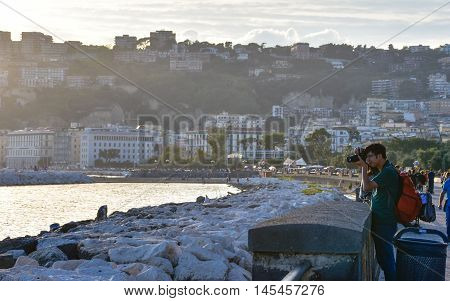 NAPLES, ITALY - OCTOBER 04: View of seafront of Naples from Via Caracciolo. Taken in October 04, 2015 in Naples, Italy.