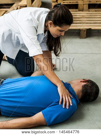 girl helping an unconscious man after fatal accident