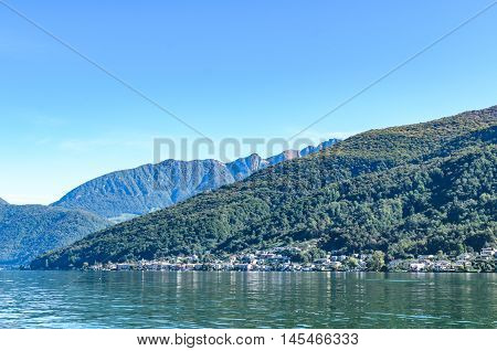 Panoramic View Of Serene Lugano Lake Surrounded By Hills In Switzerland