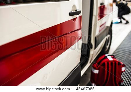 emergency medical rucksack and ambulance for an accident