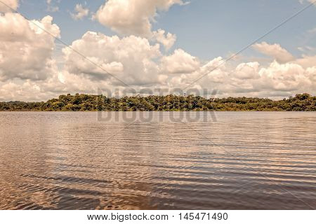 Blue Sky With White Clouds In Cuyabeno National Park Ecuador Sucumbios Province Over Laguna Grande