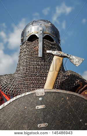 Mongol horde warrior in armour holding traditional axe