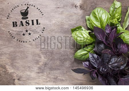 Circular stamp for spices - basil. A reprint of the stamp on a wooden surface with a bunch of basil.