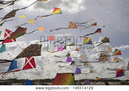 LAKOLK DENMARK - SEPTEMBER 3 2016: Colorful kites on the big beach on Lakolk Romo. International Kite Festival for the 27th time. September 3 2016.