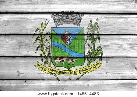Flag Of Santo Antonio Do Rio Abaixo, Brazil, Painted On Old Wood Plank Background