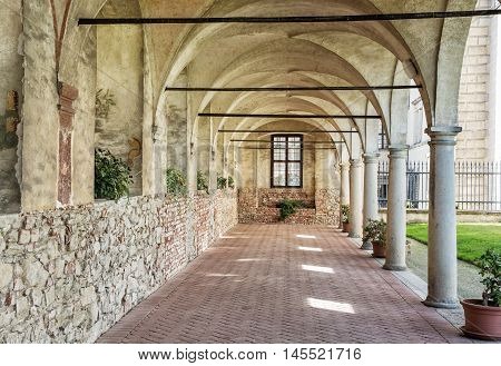 Medieval arcade corridor at Telc castle Czech republic. Architectural scene. Unesco World Heritage Site. Travel destination. Beautiful place.