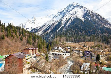 DOMBAY RUSSIA - May 03.2015: Dombai Glade. The settlement in the Caucasus Mountains skiing resort