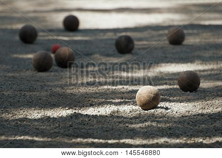 Petanque ball boules bawls on a dust floor