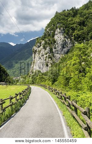 Bicycle path in Valsassina (Lecco Lombardy Italy) at summer