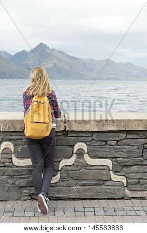 Queenstown New Zealand - March 2016: Tourist enjoying spectacular view of Lake Wakatipu at Queenstown waterfront New Zealand
