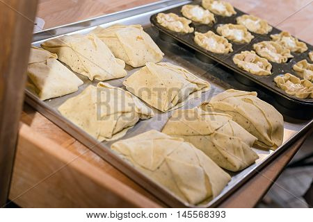 Making fresh bread in bakery. Bakery concept