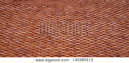 Background texture of Red Brown Color Thailand Temple Roof Pattern