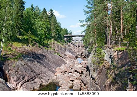 Imatra. Finland. The canyon of Imatrankoski (The Imatra Rapid) on The Vuoksi River. On the right side is Kruununpuisto Park.