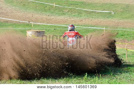Unidentified Racer Rides A Quad Motorbike.