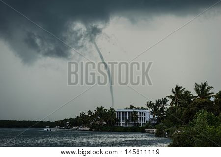 Waterspout bayside over the Florida Keys. Stormy ocean.