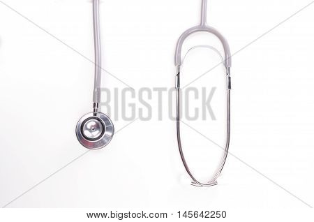 Grey stethscope isolated on white background with lighting
