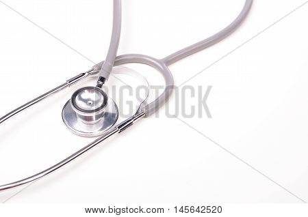 Grey stethscope isolated on white background with lighting