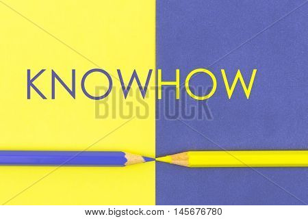 Knowhow Concept With Yellow And Violet Coloured Pencils And Paper.