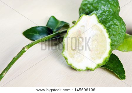 Bergamot Fruit With Leaf On Wooden Board