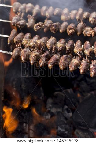 Churrasco, Traditional Brazilian Barbecue, Chicken Hearts Grilled Kebabs.