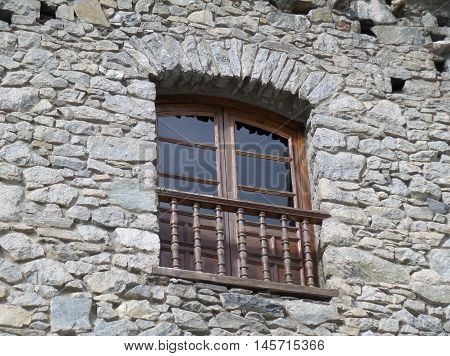 Vintage Wooden Window of a Stone Building in Andorra La Vella