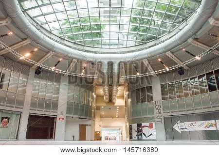 VIENNA, AUSTRIA - JUN 6, 2016: Urban design of shopping mall inside the Gasometers former gas tanks on June 6, 2016. The containers of Gasometers were built from 1896 to 1899