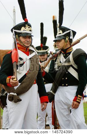 BORODINO MOSCOW REGION - SEPTEMBER 04 2016: Reenactors dressed as Napoleonic war soldiers at Borodino battle historical reenactment in Russia. Color photo.