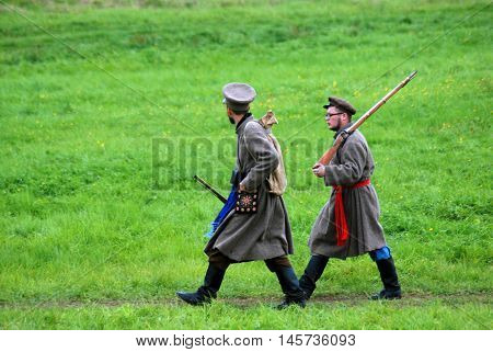 BORODINO MOSCOW REGION - SEPTEMBER 04 2016: Reenactors dressed as Napoleonic war soldiers at Borodino battle historical reenactment in Russia. Color photo.