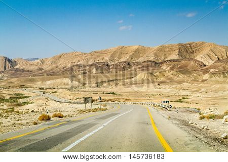 Road in Makhtesh Gadol or Large Crater, nature reserve in Negev desert, Israel
