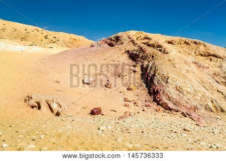 Colored sands in Makhtesh Gadol or Large Crater, nature reserve in Negev desert, Israel