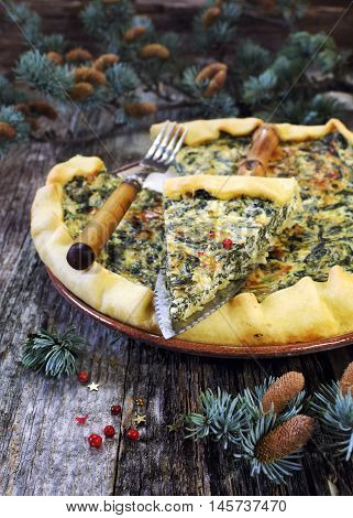 New Year mood: spinach quiche and pine branches