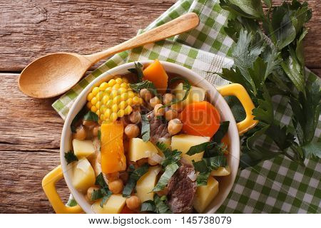 South American Cuisine: Thick Soup Pouchero Close-up In A Pot. Horizontal Top View