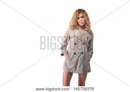 young blonde curly hair women wearing topcoat in studio