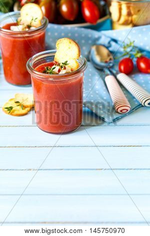Tasty no-cook soup gaspacho and fresh ingredients.