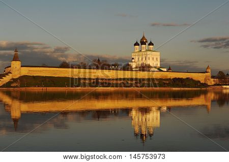 Pskov Kremlin in the evening with refflection in water