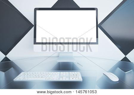 Closeup of empty white computer screen on desktop with keyboard and mouse. Chessboard patterned wall background. Mock up 3D Rendering