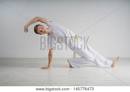 Man practicing Capoeira , brazilian martial Art.