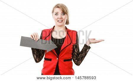 Healthy perfect female breast. Elegant girl witg black arrow sign showing her boobs unusual outfit. Confused woman present her body.