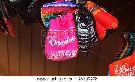 Banos de Agua Santa, Tungurahua / Ecuador - September 2 2016: Indian handmade bag sale at a craft store in the Pasaje Artesanal in the downtown of the city of Banos