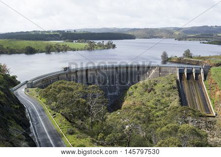 Concrete arch dam with ski-jump spillway of the Myponga Reservoir in Myponga South Australia