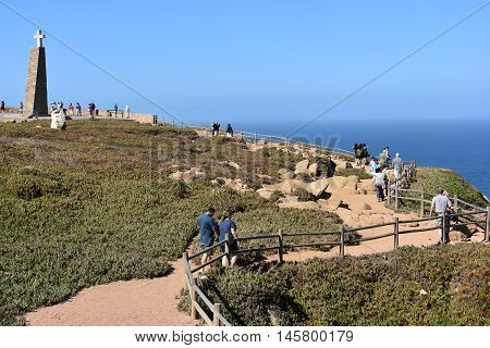 SINTRA, PORTUGAL - AUG 20: Monument declaring Cabo da Roca as the westernmost extent of continental Europe, as seen at Roca Cape near, Sintra, Portugal, on Aug 20, 2016.