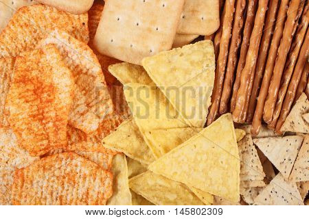Heap Of Salted Crisps, Breadsticks And Cookies, Concept Of Unhealthy Food